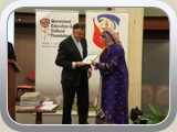 Ms Galila Abdelsalm receives the QIS Building Bridges Award for 2011